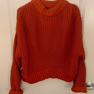 Orange cable knit sweater